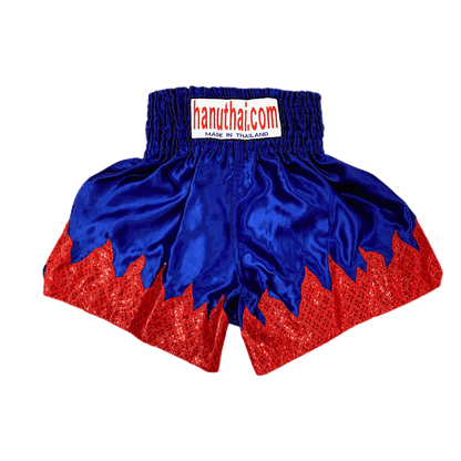 A pair of Red Flame Glitter Muay Thai boxing shorts by Hanuthai with a blue flame design.