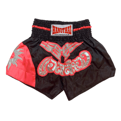 A pair of Midnight Bloom Muay Thai boxing shorts by Hanuthai.